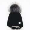 Шапка чорна зимова (меринос) з помпоном